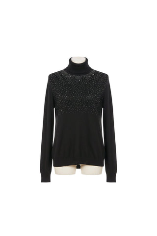 Strik med rullekrave og bling