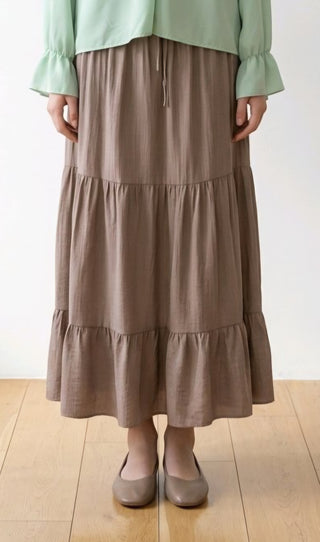 Ensfarvet nederdel, gråbrun