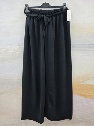 Enkle damebukser med vide ben, lette til sommeren