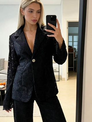 Blazer med blonde.